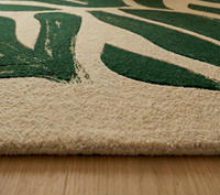 Tapis moderne en laine tufté à la main, à poils moyens et motif géométrique, avec envers antidérapant, idéal pour les maisons de luxe, les hôtels et les espaces de bureau.