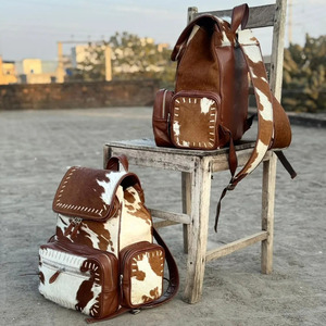 Premium handmade cowhide leather hair on school <b>backpacks</b> wholesale custom OEM supplier high quality student laptop bags - Product Image 4