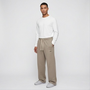 Vente en gros d'usine de pantalons cargo en nylon à jambes larges avec logo personnalisé pantalons baggy à jambes réglables en nylon pantalons de travail pour hommes pantalons d'hiver - Product Image 1