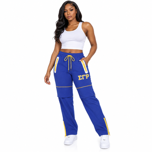 Pantalones Deportivos Azul Rey con Bordado de Letras Griegas Doradas, Cintura con Cordón Amarillo, Bolsillos con Cremallera, Pierna Recta, Estilo Atlético - Product Image 1