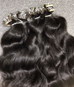 TOP Selling Natural Wavy Tape in Hair <strong>Extensions</strong> Raw Human Hair Easy <strong>Caring</strong> at Home Best Price Best Quality