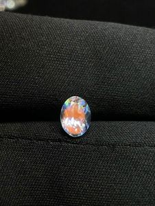Pierre de lune arc-en-ciel naturelle, taille ovale, facettée, à reflets multicolores, avec effet œil de feu net. - Product Image 2