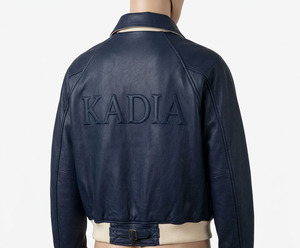 Custom <b>Men</b>’s Navy Blue Genuine Leather <b>Bomber</b> <b>Jacket</b> – Embossed Logo <b>Varsity</b> Style – Premium Lambskin Outerwear with Ribbed Trim - Product Image 4