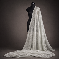 Tissu en mousseline de coton premium brodé à la dentelle florale ajourée pour robes, kurtis, dupattas et confection de vêtements de mariage pour femmes - Exportation