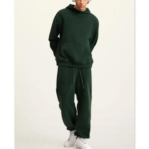 Survêtement ample et respirant, confectionné avec un tissu à séchage rapide, haut ample et pantalon évasé extensible pour les activités sportives. - Product Image 2