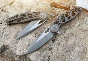 Navaja <span class=keywords><strong>Plegable</strong></span> EDC <span class=keywords><strong>de</strong></span> Alta Dureza con Mango <span class=keywords><strong>de</strong></span> Aleación <span class=keywords><strong>de</strong></span> Titanio y Acero M390 <span class=keywords><strong>de</strong></span> Primera Calidad, OEM, para Campamento, Bolsillo, <span class=keywords><strong>Caza</strong></span>, Supervivencia al Aire Libre - Product Image 2