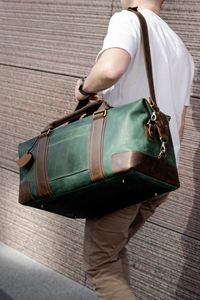 กระเป๋าเดินทางหนังแท้สำหรับผู้ชายรุ่นใหม่ล่าสุด กันน้ำ ราคาถูก ขายออนไลน์ - Product Image 2