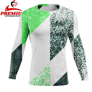 Diseña tu Rash Guard Negro Liso Personalizado, Rash Guard MMA en Blanco, Rash Guard BJJ de Manga Larga para Hombre al por Mayor - Product Image 1