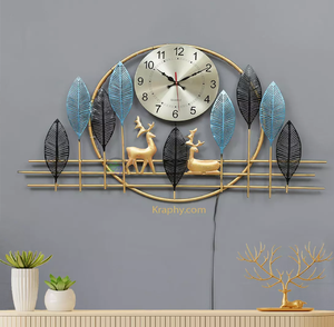 Beautiful nature inspired metal wall <b>clock</b> with golden deer and blue tree leaves, available at wholesale prices. - Product Image 1