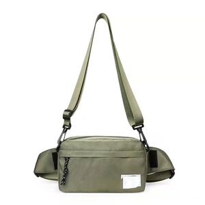 Bolso bandolera unisex de nailon con cierre de cremallera y decoración de borlas, estilo cruzado en verde oliva para uso diario. - Product Image 1
