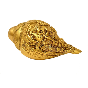 Intricately carved golden brass shankh displaying Lord Vishnu resting posture, ideal for gift, available at wholesale prices. - Product Image 1