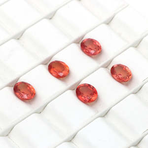 พลอยแซฟไฟร์พัพพารัดชาสังเคราะห์รูปไข่ ขนาด 2x3–15x20 มม. สีชมพูพีช สำหรับทำเครื่องประดับตามสั่ง - Product Image 1