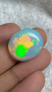 Opale naturelle, pierre précieuse en vrac, taille ovale, polie, avec jeu de couleurs et effet de feu, pour la fabrication de bijoux - Product Image 1