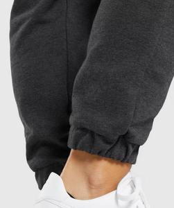 Pantalones deportivos de punto de cintura media para mujer, de color liso, con cordón y bolsillos, para uso casual en otoño. - Product Image 5