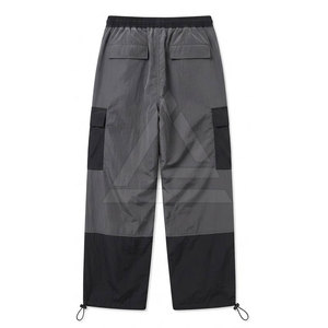 Pantalones Parachute Relajados para Hombre con Cintura Ajustable, Corte de Pierna Ancha, Bolsillos Funcionales y Estilo Urbano Moderno - Product Image 2