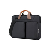 Sacoche pour ordinateur portable en nylon noir avec fermeture éclair, poignée et bandoulière, design minimaliste pour les voyages d'affaires