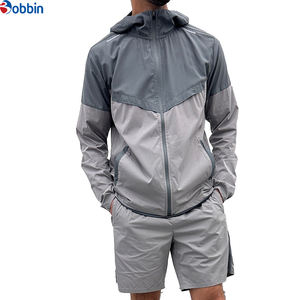 BOBBIN INDUSTRIES Conjuntos Deportivos Hip Hop con Logotipo Personalizado para Hombre, Chaqueta Cortavientos, Pantalones Cortos, Conjunto Deportivo con Bloques de Color Personalizados, Transpirable - Product Image 1