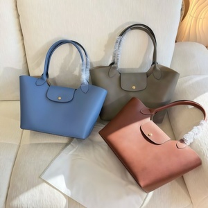 Nouveau <span class=keywords><strong>sac</strong></span> à main en cuir de vachette brun en forme de lingot d'or de grande taille pour femmes, <span class=keywords><strong>sac</strong></span> à main simple à bandoulière pour les trajets quotidiens, grande capacité, <span class=keywords><strong>sac</strong></span> <span class=keywords><strong>seau</strong></span> tendance - Product Image 1
