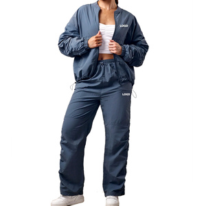 Ensemble short et blouson bomber femme deux pièces en tissu tissé imperméable écologique avec logo personnalisé Storm Blue, style streetwear, coupe ample, manches longues - Product Image 4