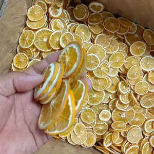 Fournisseur vietnamien de tranches d'orange jaunes séchées pour la cuisine, la pâtisserie et le thé, 100% naturelles, déshydratées, épaisseur 3/4 mm - Product Image 1