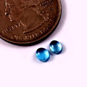 Lote al por mayor de topacio azul cielo natural de 5x7 mm, cabujón ovalado, parte trasera plana, piedra preciosa suelta calibrada para fabricación de joyas - Product Image 2