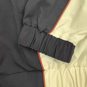 Conjunto de dos piezas de chaqueta cortavientos de lujo personalizada con cremallera y pantalón de chándal de nailon para hombre - Product Image 6