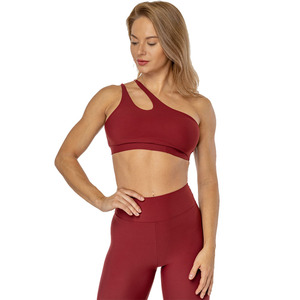 Sujetador deportivo acolchado transpirable para mujer con diseño de logo personalizado, soporte medio, espalda cruzada, 100% nailon, tipo top de yoga - Product Image 1