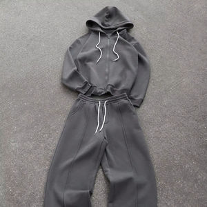 เสื้อฮู้ดมีซิปหน้าสีพื้นแบบยูนิเซ็กซ์ แขนยาว มีเชือกผูกเอว กางเกงวอร์มสตรีทแวร์ทรงหลวมโอเวอร์ไซส์สำหรับฤดูหนาว - Product Image 1