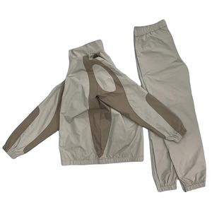 Conjunto de 2 Piezas de Pantalones Deportivos de Invierno con Cierre, Tallas Grandes, Unisex, con Ribetes Elásticos, Chaqueta Cortavientos de Nailon, Traje Deportivo de Alta Calidad, Personalizado OEM - Product Image 3