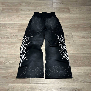 Pantalones de chándal de pana personalizables con logo bordado, de pierna ancha, con rayas laterales, transpirables, ecológicos, con cierre de cordón, estilo urbano. - Product Image 3