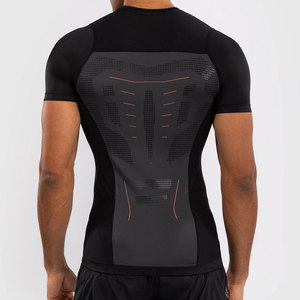 Men's <b>Black</b> Short <b>Sleeve</b> Compression Rash Guard With Orange Stitching And <b>Mesh</b> Panels For Quick Dry Performance Wear - Product Image 2