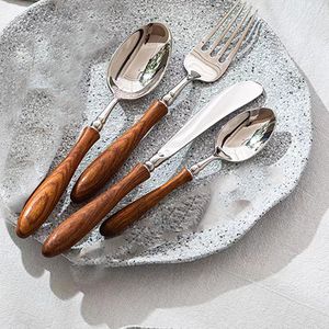 Juego de cubiertos de acero inoxidable de calidad para restaurantes con etiqueta privada y mango de madera, diseñado para uso comercial y doméstico. - Product Image 1