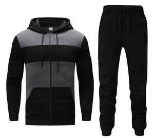 Chándal para hombre con chaqueta con cremallera diseñado con tela de algodón mezclado de alta calidad que ofrece comodidad y estilo para entrenamientos en el gimnasio y correr. - Product Image 1
