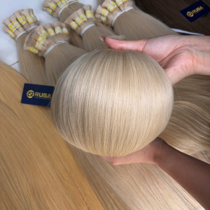 Cabello humano real procedente de Vietnam con cutícula alineada para salones y mayoristas, en colores rubio y ombré. - Product Image 1