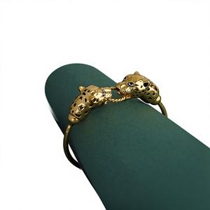 22K <b>Solid</b> <b>Gold</b> Baby <b>Bracelet</b> Featuring Handcrafted Twin Lion Head Design on Durable Black Cord for Kids and Toddler - Product Image 1