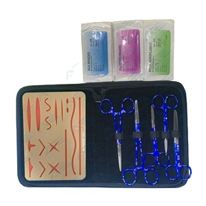Kit de Práctica de Sutura Quirúrgica, Kit de Sutura Médica con Almohadilla de Piel Sintética, Instrumentos Médicos para Entrenamiento Profesional de Sutura - Product Image 1