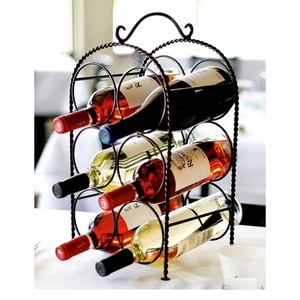 Support à vin moderne en fer forgé pour 4 bouteilles, avec cadre métallique et design artisanal, idéal pour la présentation sur table et les événements festifs. - Product Image 2
