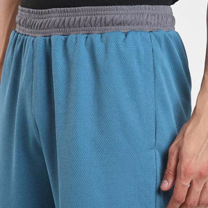Shorts Bermuda pour homme, couleur unie, avec taille élastique et poches, style décontracté, en coton tricoté respirant, taille mi-haute - Product Image 4