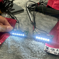 Dernière veste ou gilet chauffant intelligent à LED 2026 avec éclairage de poche sur le capuchon ou le dos pour le camping, l'escalade, la randonnée, le ski
