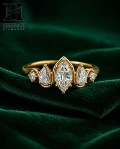 Bague de mariage vintage avec diamant taille marquise, pierres latérales en forme de poire, design unique multi-pierres - Product Image 1