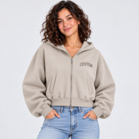 Hoodie court personnalisé pour femme, beige, zippé, coupe courte, épaules tombantes, en polaire, style minimaliste