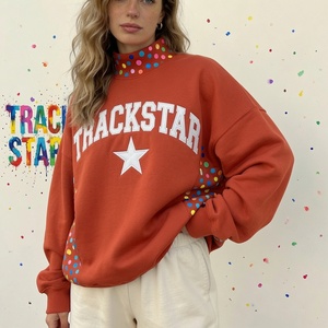Sweat-shirt d'hiver vert oversize pour femme avec motif étoile Trackstar et empiècements latéraux à pois colorés, écologique - Product Image 2