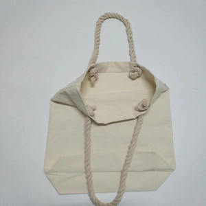 กระเป๋าผ้าแคนวาสขนาดใหญ่พิเศษแบบมีหูหิ้วเชือก พิมพ์ลายตัวอักษรโลโก้ตามสั่ง ทนทาน ใช้ซ้ำได้ เหมาะสำหรับใส่ของไปชายหาดหรือช้อปปิ้ง - Product Image 6