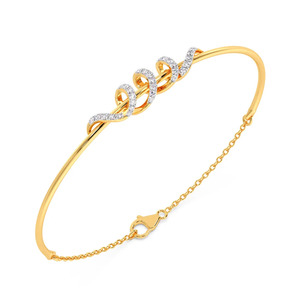 Brazalete de Diamantes con Diseño de Onda Esculpida, Banda Delgada de Oro Amarillo y Centro con Cinta Fluida - Product Image 1