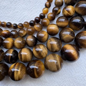 ลูกปัดหินตาเสือสีน้ำตาลธรรมชาติจากแอฟริกาใต้ ขายส่ง 7A ขนาด 2-12 มม. หลายขนาด รูปทรงกลม เรียบเนียน ลูกปัดตาเสือธรรมชาติแบบหลวม - Product Image 5