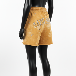 Shorts femme en molleton coton polyester 320 GSM premium, effet délavé doré, avec logo personnalisé par transfert thermique et strass. - Product Image 5