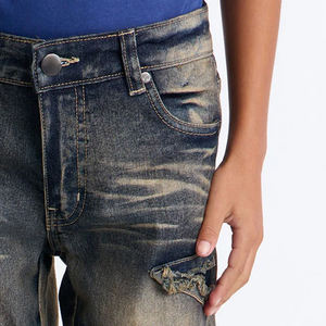 กางเกงยีนส์เดนิมวินเทจ ดีไซน์ทันสมัย สวมใส่สบาย ทรงหลวม ชุดลำลองสมาร์ทแคชชวลสำหรับเด็กผู้ชาย คอลเลคชั่นขายส่ง - Product Image 3