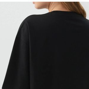 Camiseta Negra Oversize para Mujer al por Mayor, 100% Algodón, con Logotipo Personalizado, Lisa, Casual, de Corte Holgado, Básica, OEM, Marca Privada - Product Image 2