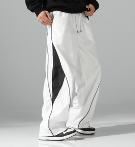 Pantalon de survêtement blanc surdimensionné pour homme, coupe large, avec empiècements latéraux contrastants noirs et détails de passepoil, taille à cordon de serrage – Vente en gros personnalisée - Product Image 2