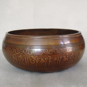 Fabricants et exportateurs de bols chantants tibétains bruns antiques en relief, vente directe d'usine OEM - Product Image 1